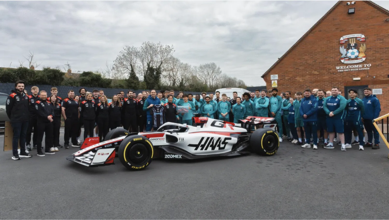Haas swaps circuit for pitch, visits football club Coventry City