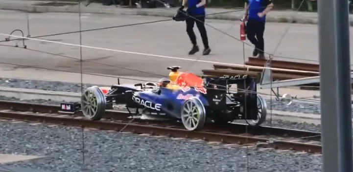 VIDEO | Red Bull working on new promotional stunt, races F1 car over metro rails