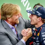 King Willem-Alexander presents winner's trophy during final Dutch GP at Zandvoort