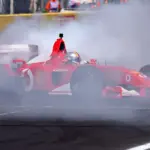 VIDEO: Sebastian Vettel warms up Italian fans with Michael Schumacher's V10 Ferrari
